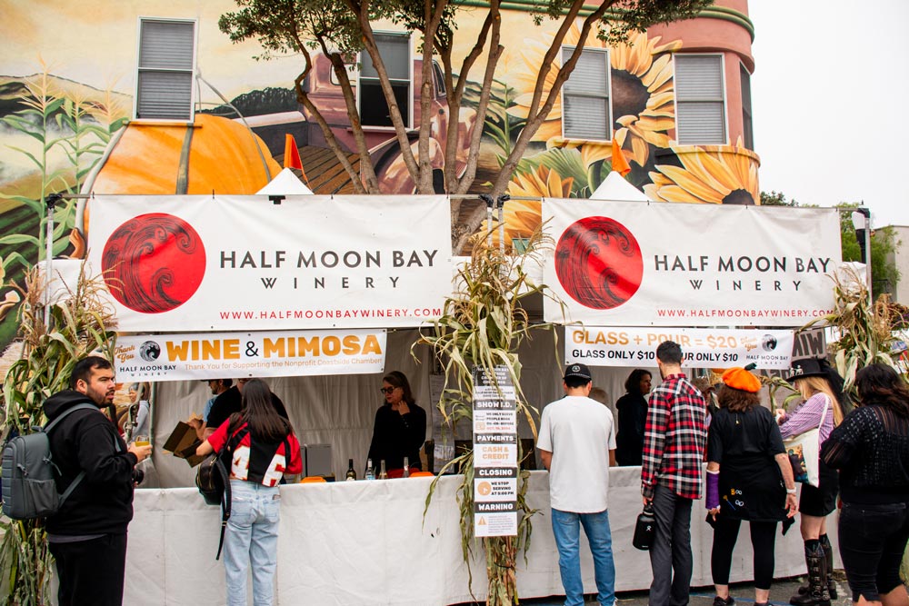 Half Moon Bay Winery vintage truck and banner at the annual Half Moon Bay Art & Pumpkin Festival parade